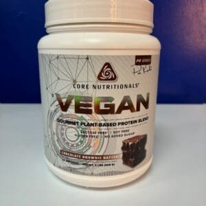 A container of vegan protein is sitting on the counter.