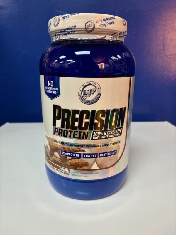 A jar of protein on top of a table.