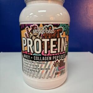 A container of protein is sitting on the counter.