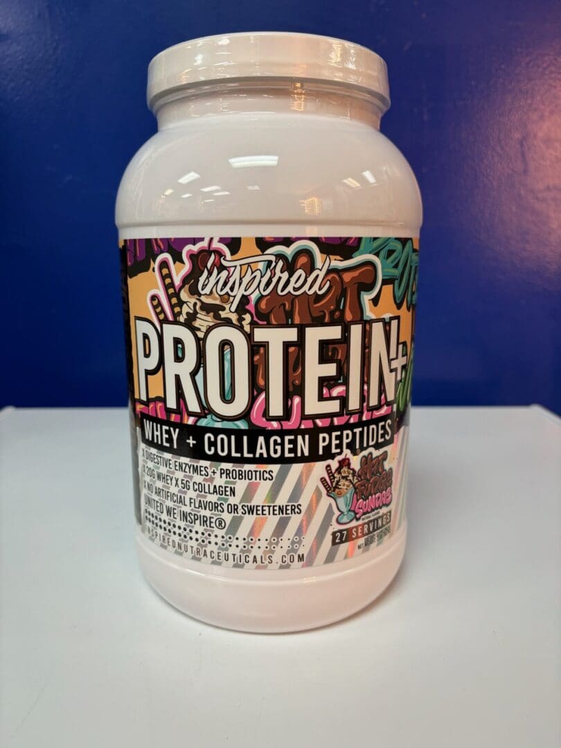 A container of protein is sitting on the counter.