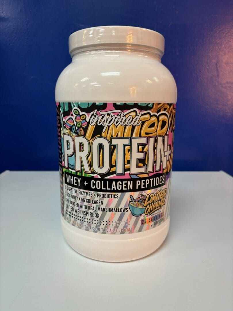 A bottle of protein on top of a table.