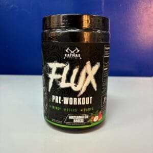 A jar of flux pre-workout is sitting on the counter.