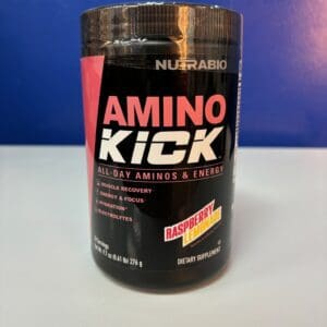 A container of amino kick is shown on the table.