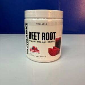 A container of beet root powder is sitting on the counter.