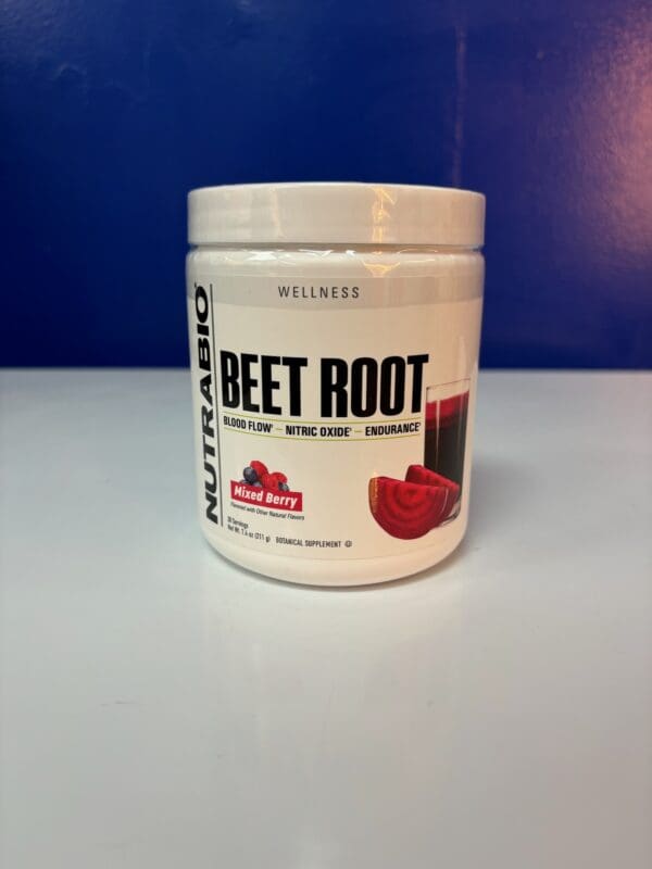 A container of beet root powder is sitting on the counter.