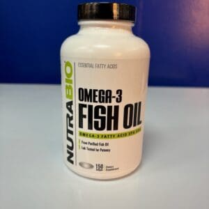 A bottle of fish oil on top of a table.