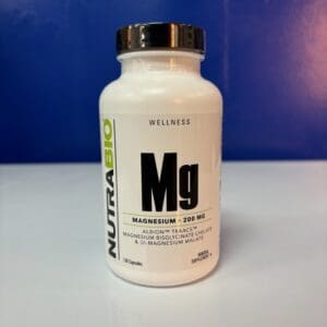 A bottle of magnesium is sitting on the table.