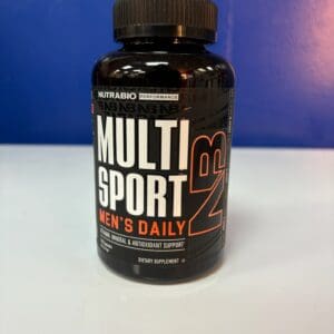 A bottle of multi sport supplement on top of a table.