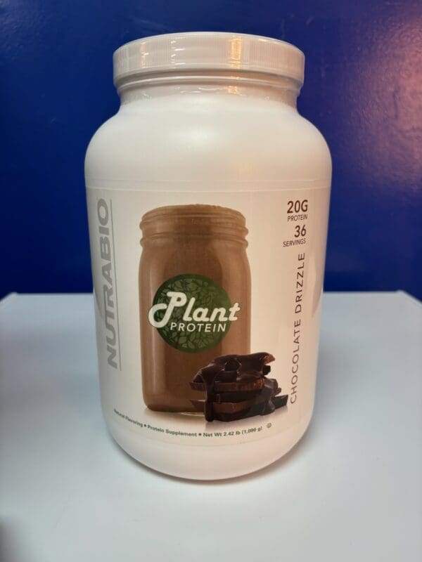 A jar of plant protein with chocolate on it.