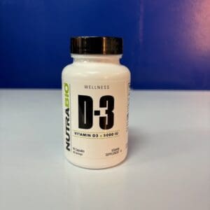 A bottle of vitamin d 3 on top of a table.