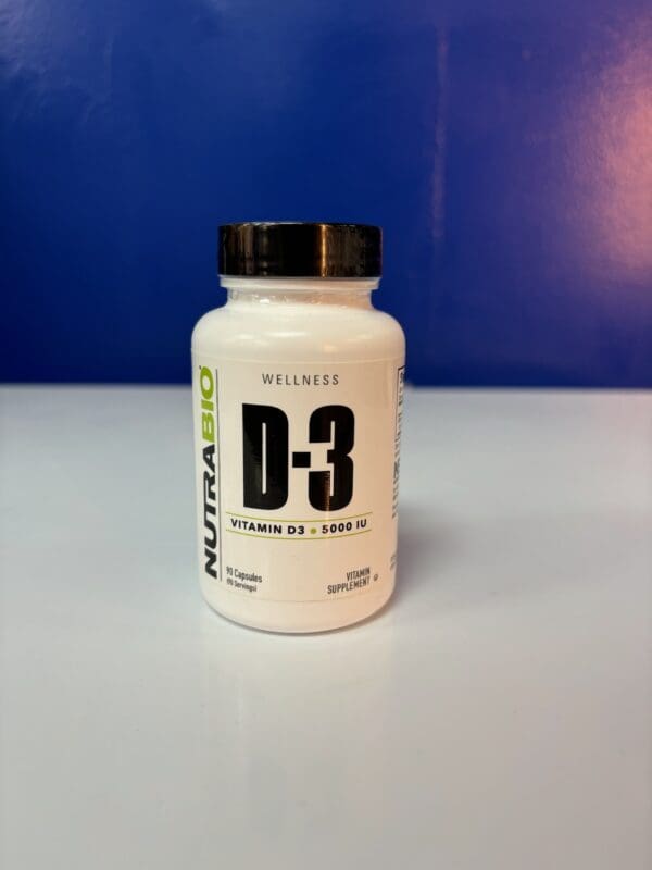 A bottle of vitamin d 3 on top of a table.