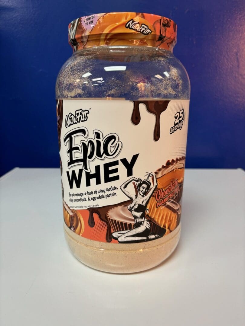 A jar of whey protein on a table.