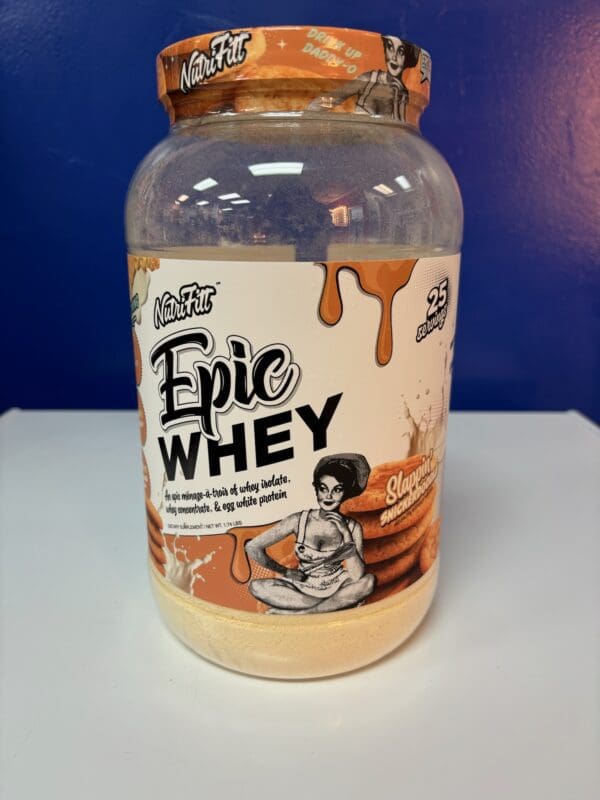 A jar of epic whey on a table.