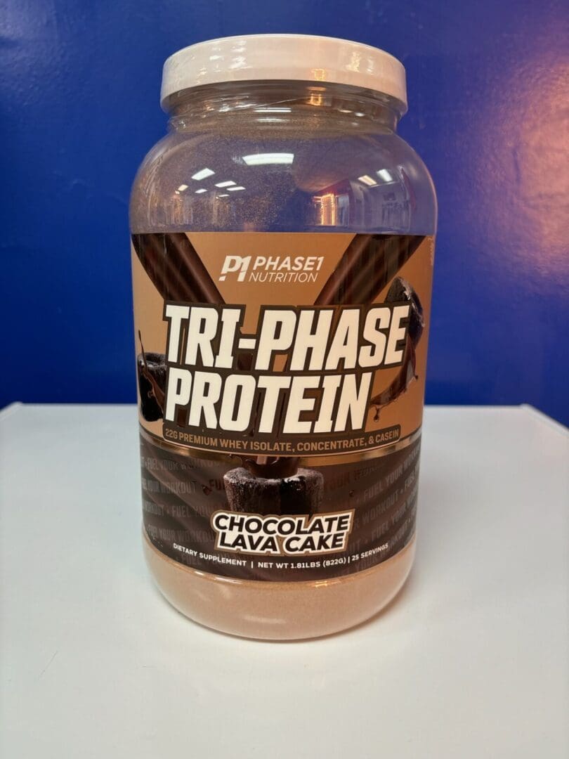 A jar of protein on top of a table.