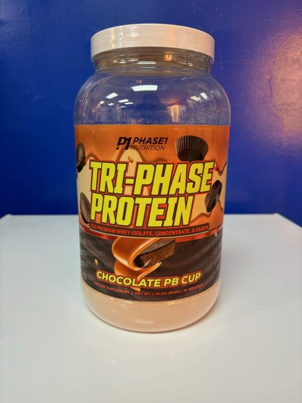 A jar of protein on top of a table.