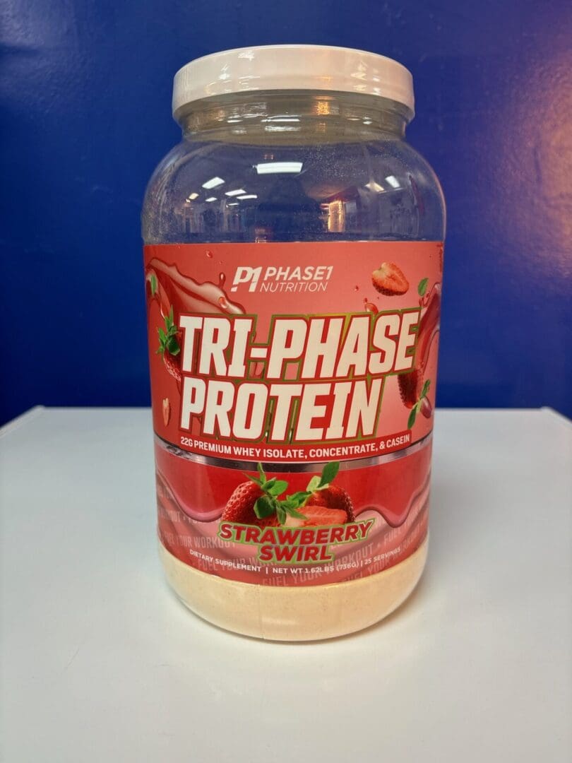 A jar of protein on top of a table.