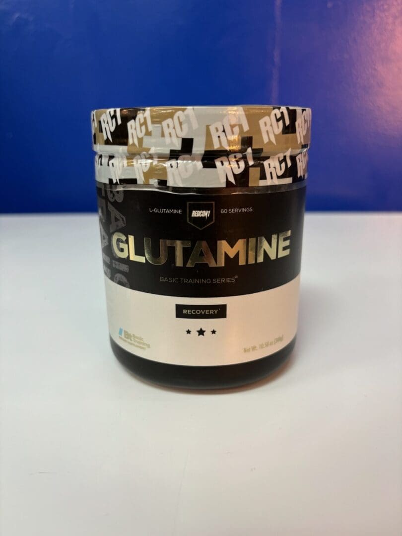 A jar of glutamine on top of a table.